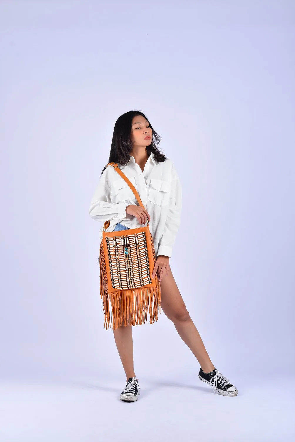 CAMEL Medium Size Boho Leather Bag with Fringes and Bone Choker.